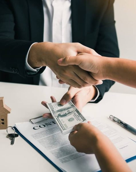 home-sales-agents-and-buyers-work-on-signing-new-h-2023-11-27-05-16-42-utc (1)